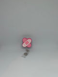 Pink Bandaid Retractable Badge Reel