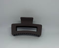 Dark brown matte rectangle hair claw clip with open design and strong grip teeth