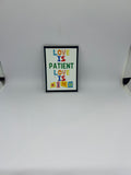 Love Is Patient Love Is Kind colourful mixed-font magnet with black border