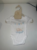 White short sleeve baby onesie with watercolour sleepy teddy bear on cloud and blue bunting print on newborn hanger